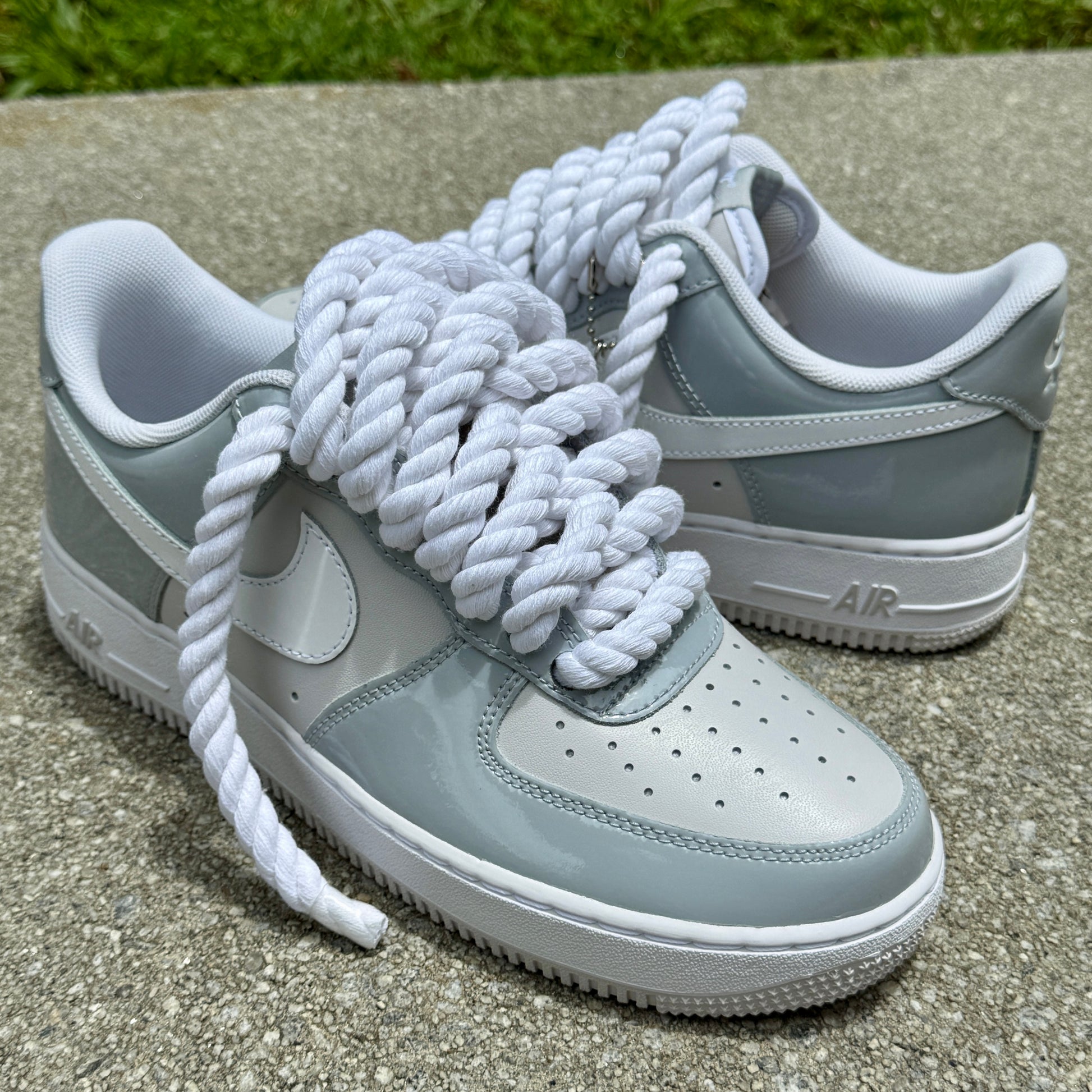 gray and white patent leather air force 1